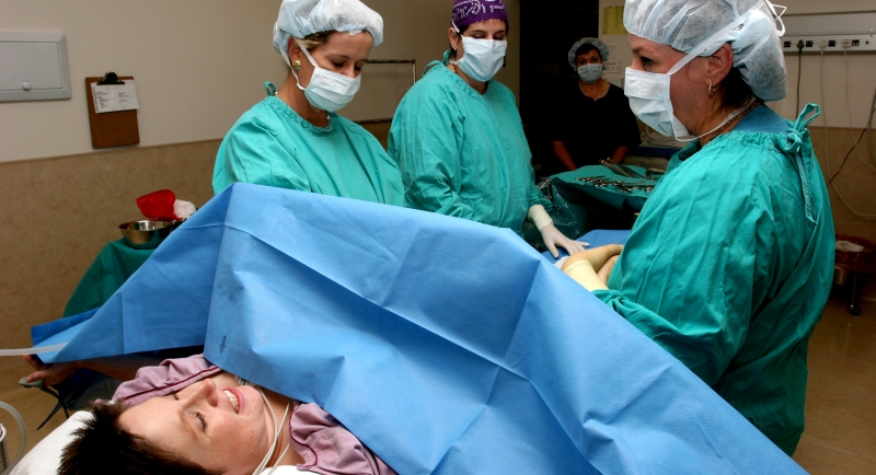 Woman in the operating room before a delivery